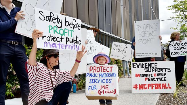 Kelly Ponsford and daughter Caitlin, 2, were among protesters at the official opening of the Northern Breaches Hospital at Frenchs Forest. Picture: Troy Snook.