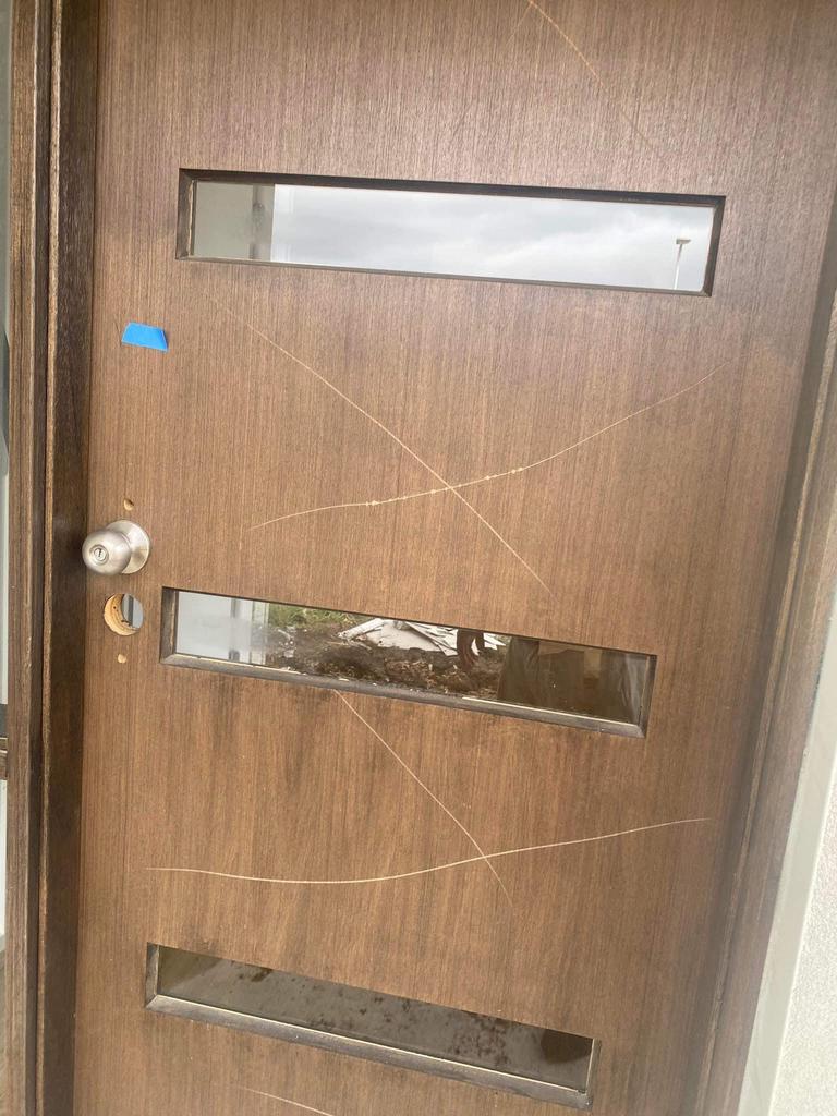 Doors and walls were scratched with a knife. Picture: Herald Sun