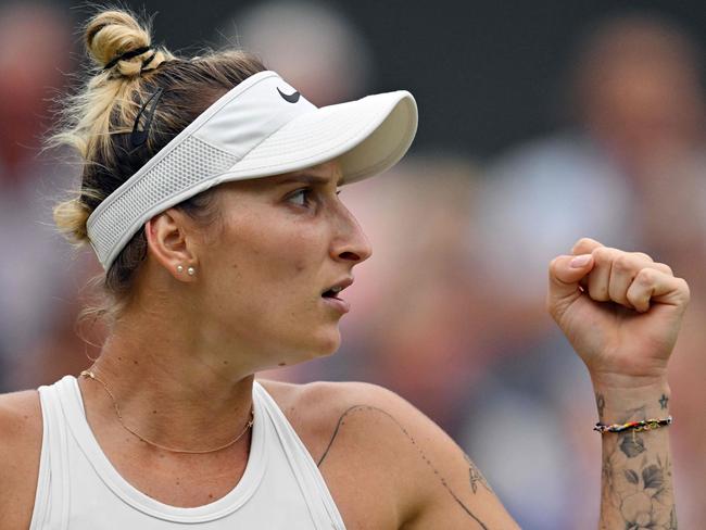 Czech Republic's Marketa Vondrousova reacts as she plays Ukraine's Elina Svitolina during their women's singles semi-finals tennis match on the eleventh day of the 2023 Wimbledon Championships at The All England Lawn Tennis Club in Wimbledon, southwest London, on July 13, 2023. (Photo by Glyn KIRK / AFP) / RESTRICTED TO EDITORIAL USE