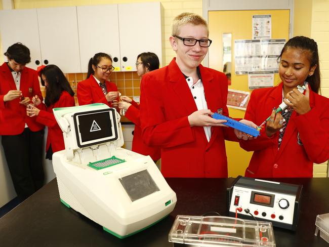 Plumpton High School Year 9 students Bryce Kinsey and Shaibah Hussain (front) test DNA samples in their forensic science class. Picture: Sam Ruttyn