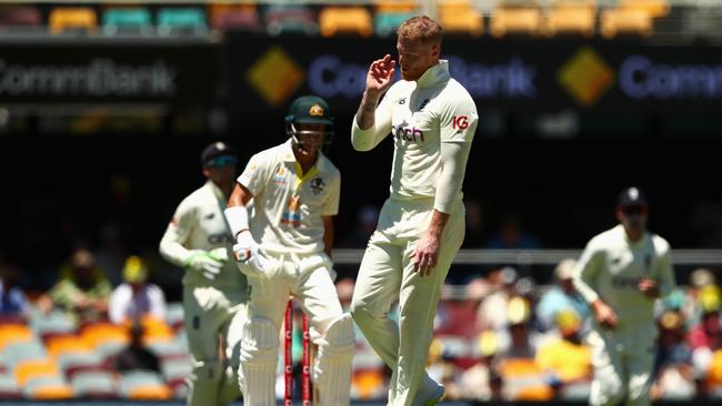 Stokes reacts after bowling a no ball to dismiss David Warner. Picture: Getty