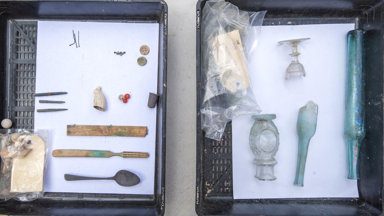 Hundreds of artefacts, some dating back to early 1800s, have been uncovered at Hunter Street’s metro site. Glass and miscellaneous items, including a toothbrush, a spoon, a thimble and buttons, retrieved. Picture: supplied