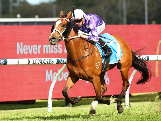 SYDNEY, AUSTRALIA - SEPTEMBER 23: Nash Rawiller riding Espiona wins Race 6 Racing and Sports Golden Pendant during "Kia Golden Rose Day" - Sydney Racing at Rosehill Gardens on September 23, 2023 in Sydney, Australia. (Photo by Jeremy Ng/Getty Images)