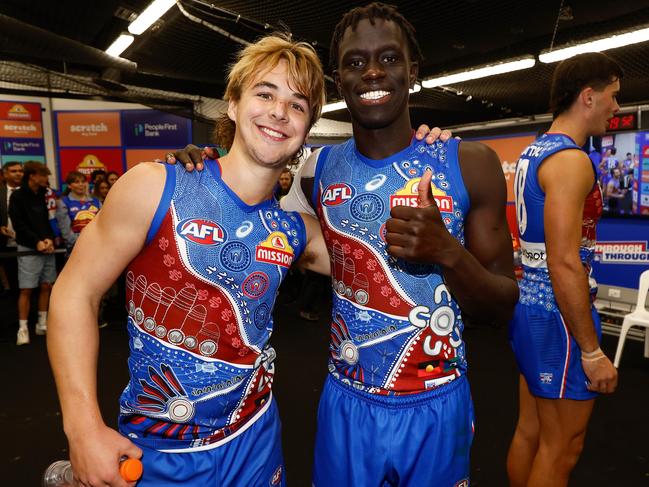 Ryley Sanders and Buku Khamis after the win. Picture: Michael Willson/AFL Photos