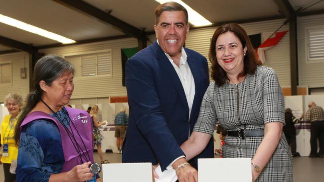 Queensland Premier Annastacia Palaszczuk and Milton Dick cast their vote at Inala State School. Picture: AAP/Image Sarah Marshall