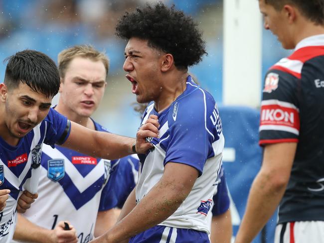 Paul Alamoti roars after one of his two tries. Picture: David Swift.