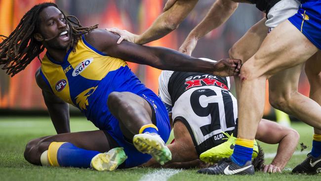 Nic Naitanui after tackling Karl Amon.