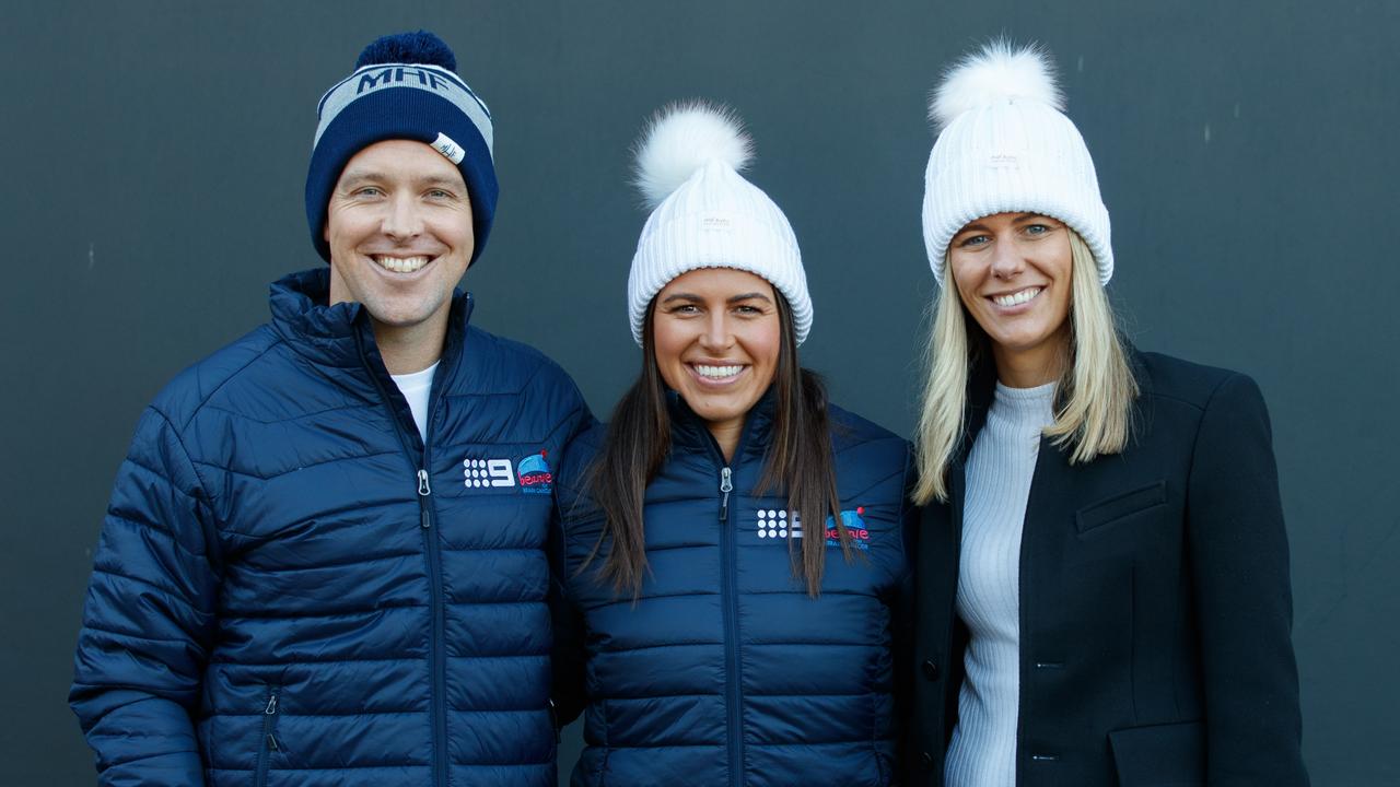 Danika Mason (C) wearing a Mark Hughes Foundation beanie. Picture: Tim Pascoe