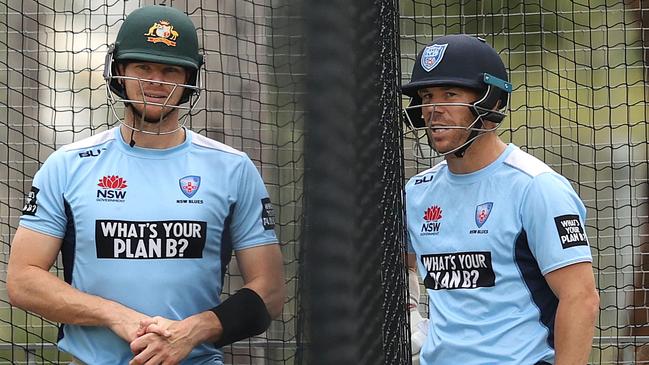 Steve Smith and David Warner during the Australian cricket teams training at ANZ Stadium. The cricketers are now in isolated groups away from their state teammates as they prepare for their upcoming One-Day and T20 series in England. They will be the first Australian sports team to travel abroad since Covid began. The squad is expected to be named as early as today. Picture. Phil Hillyard