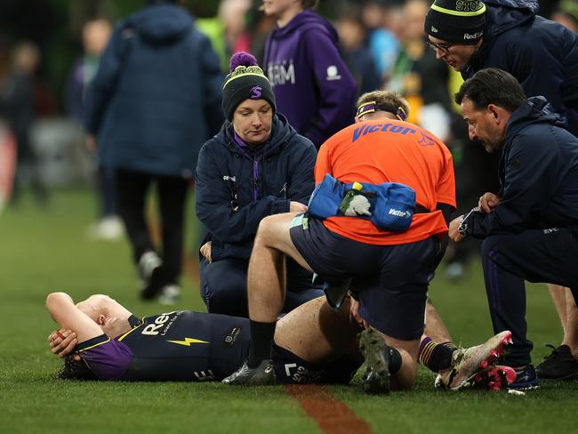 MELBOURNE, AUSTRALIA - JULY 20: Grant Anderson of the Storm is injured in the final minute during the round 20 NRL match between Melbourne Storm and Sydney Roosters at AAMI Park, on July 20, 2024, in Melbourne, Australia. (Photo by Kelly Defina/Getty Images)