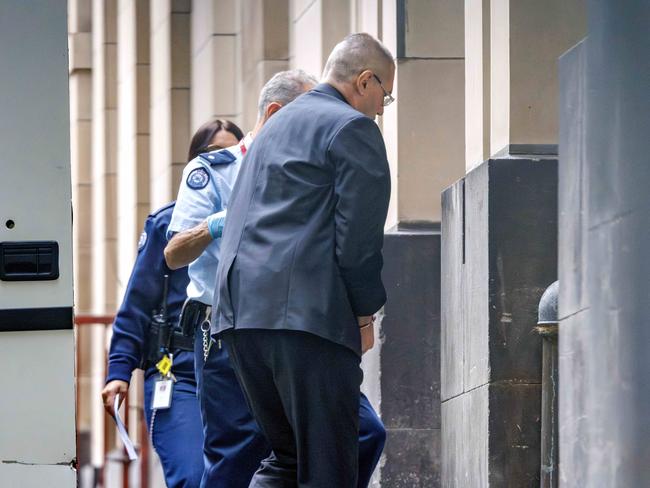 Gordon Ivankovic is led into Victorian Supreme Court for sentencing. Picture: NewsWire