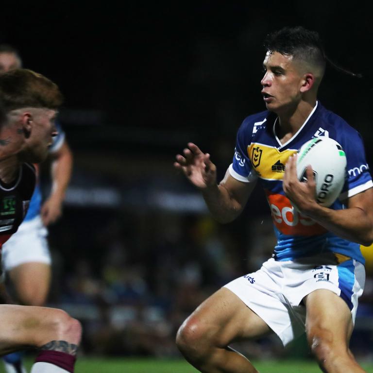 Gold Coast Titans fullback Jayden Campbell challenges the Burleigh Bears line during a pre-season trial at Pizzey Park in 2021.