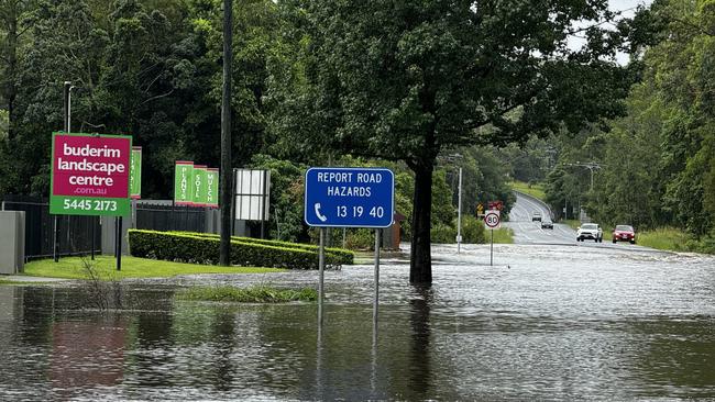 The bottom of Crosby Hill Road at Forest Glen and a well-placed sign to report road hazards. Picture: Mark Furler