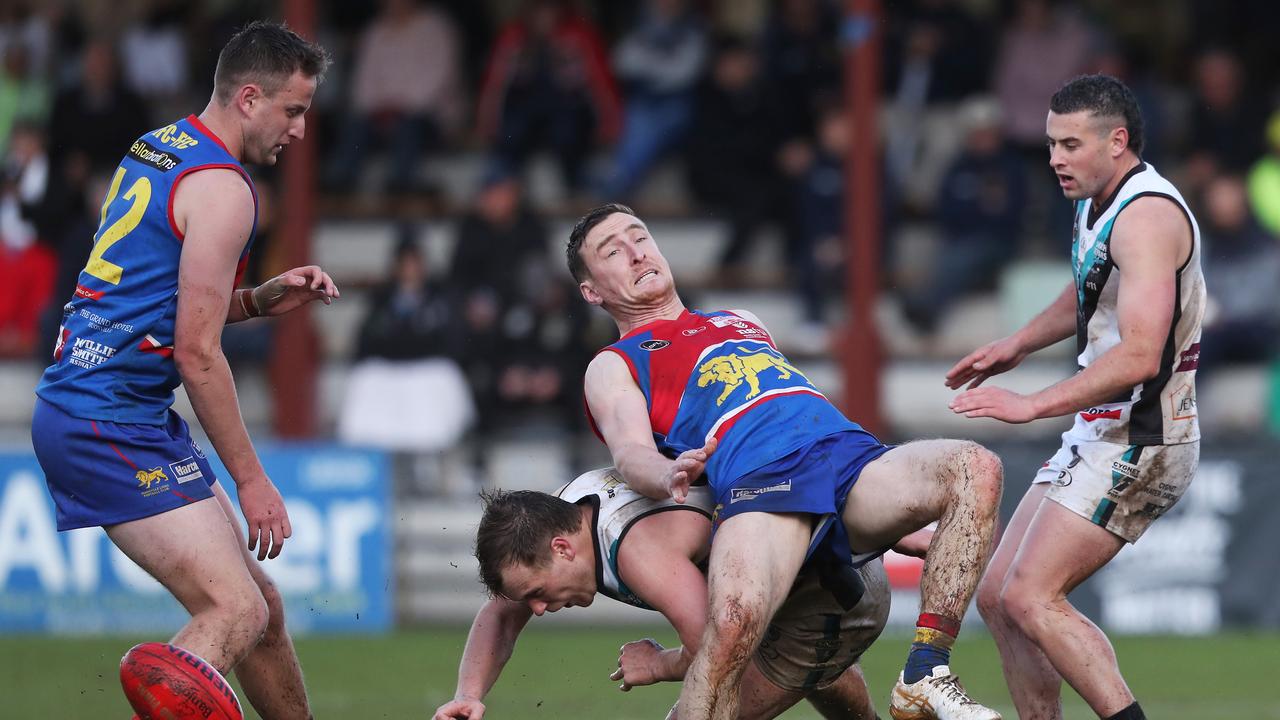 Lachy Watt Cygnet and Dale Thorp Huonville Lions. Huonville Lions V Cygnet seniors. SFL grand finals at North Hobart Oval. Picture: Nikki Davis-Jones