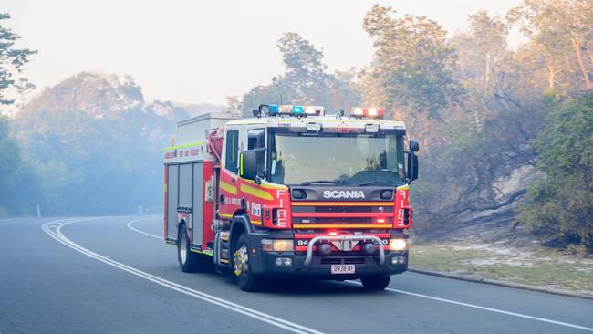 Queensland Fire and Emergency Services rush to the Peregian Beach bushfire last month. Picture: Wavell Bush Photography