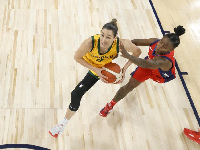 Bec Allen #9 of the Australia Opals drives to the basket against Jewell Loyd #4 of the United States. Picture: Ethan Miller/Getty Images/AFP