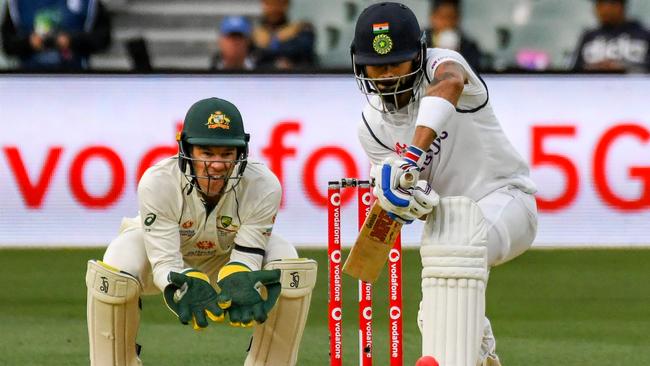 India's captain Virat Kohli plays a defensive shot at Adelaide Oval Picture: AFP