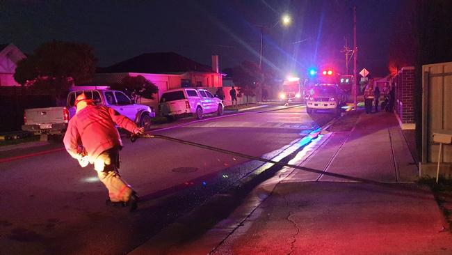 A firefighter on Fife Street at Woodville South.