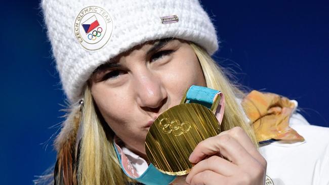 Czech Republic's gold medallist Ester Ledecka kisses her medal on the podium. Picture: AFP