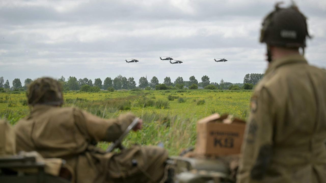 MH-60 Blackhawk helicopters fly over Carentan-Les-marais, northwestern France, as part as the D-Day 80th anniversary, on June 2nd, 2024. Picture: Lou Benoist / AFP