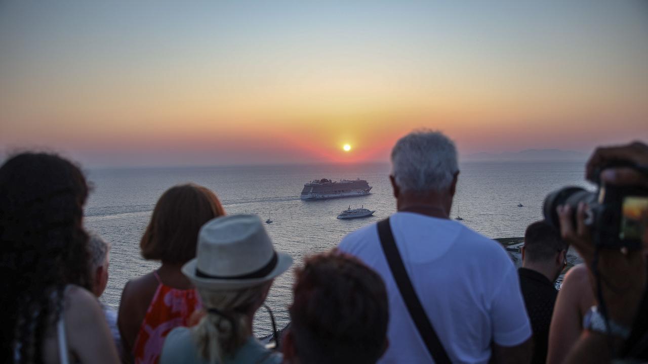 Locals and authorities have complained about over-tourism for more than a decade claiming the island’s infrastructure and water supply can’t cope with more people. Picture: Aris Oikonomou / AFP