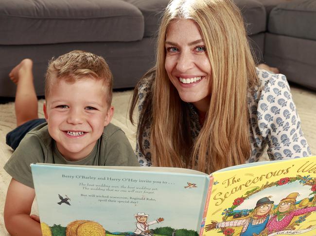 Ali Lowe reading with her son Atticus, 5. Picture: Tim Hunter.