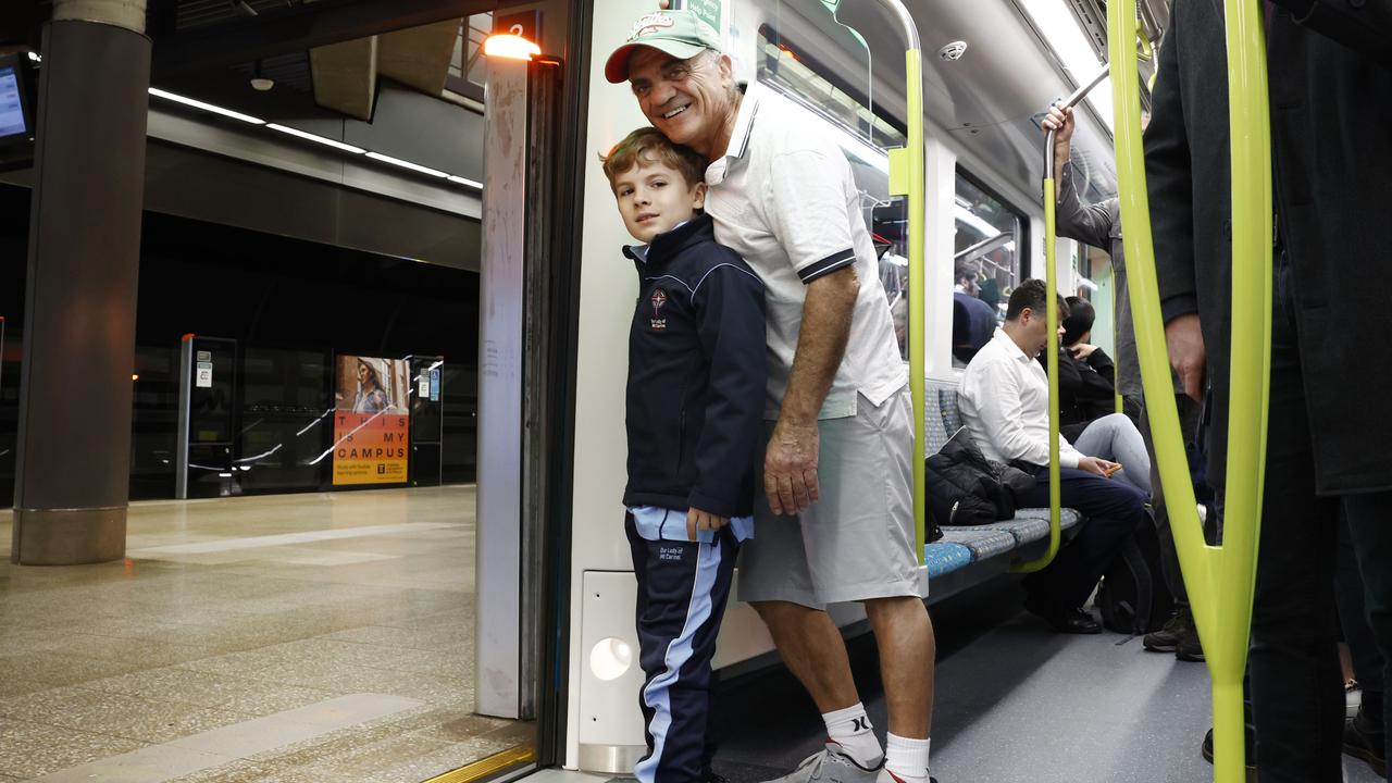 Pictured is on a Sydney Metro carriage is Adam Riakos and his grandfather Mosh Riakos. They were among the first passengers on the brand new Sydney Metro on its maiden run to Tallawong at 4.54am. Picture: Richard Dobson