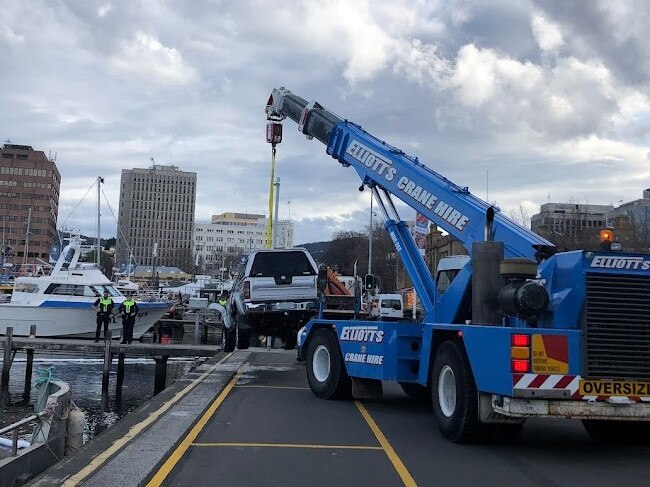 A crane lifts the car out of the water. Picture: Nikki Davis-Jones