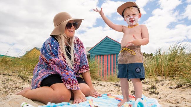 Steph Griffiths and her son Will, 2, at Chelsea Beach. Picture: Jason Edwards