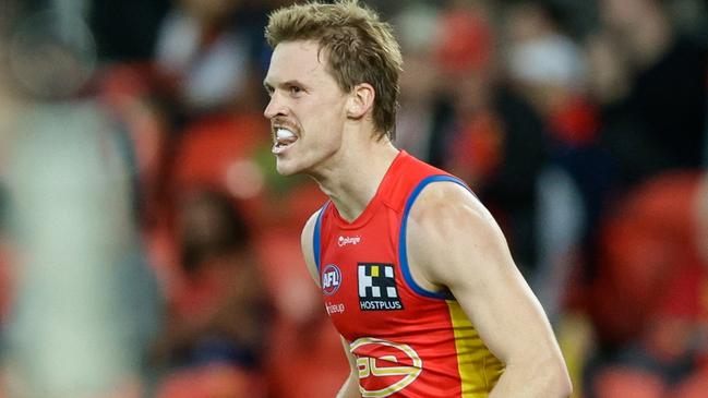 GOLD COAST, AUSTRALIA - MAY 06: Noah Anderson of the Suns celebrates a goal during the 2023 AFL Round 08 match between the Gold Coast Suns and the Melbourne Demons at Heritage Bank Stadium on May 6, 2023 in the Gold Coast, Australia. (Photo by Russell Freeman/AFL Photos via Getty Images)