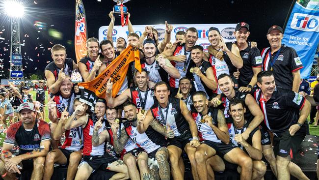 Southern Districts celebrate their 2024-25 NTFL grand final win against St Mary's. PIcture: Pema Tamang Pakhrin