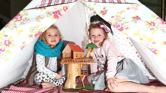 Eva Carey and Eve Sutherland enjoying play time indoors. Picture: David Clark