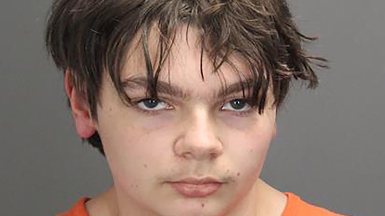 (FILES) In this file photo taken on December 02, 2021 this booking photo released by the Oakland County Sheriff's Office in Michigan shows shooting suspect Ethan Crumbley. – The parents of a 15-year-old boy who shot dead four fellow students at his high school in the northern US state of Michigan were charged with involuntary manslaughter on December 3, 2021. (Photo by HANDOUT / Oakland County Sheriff's Office / AFP) / RESTRICTED TO EDITORIAL USE – MANDATORY CREDIT "AFP PHOTO /Oakland County Sheriff's Office" – NO MARKETING – NO ADVERTISING CAMPAIGNS – DISTRIBUTED AS A SERVICE TO CLIENTS