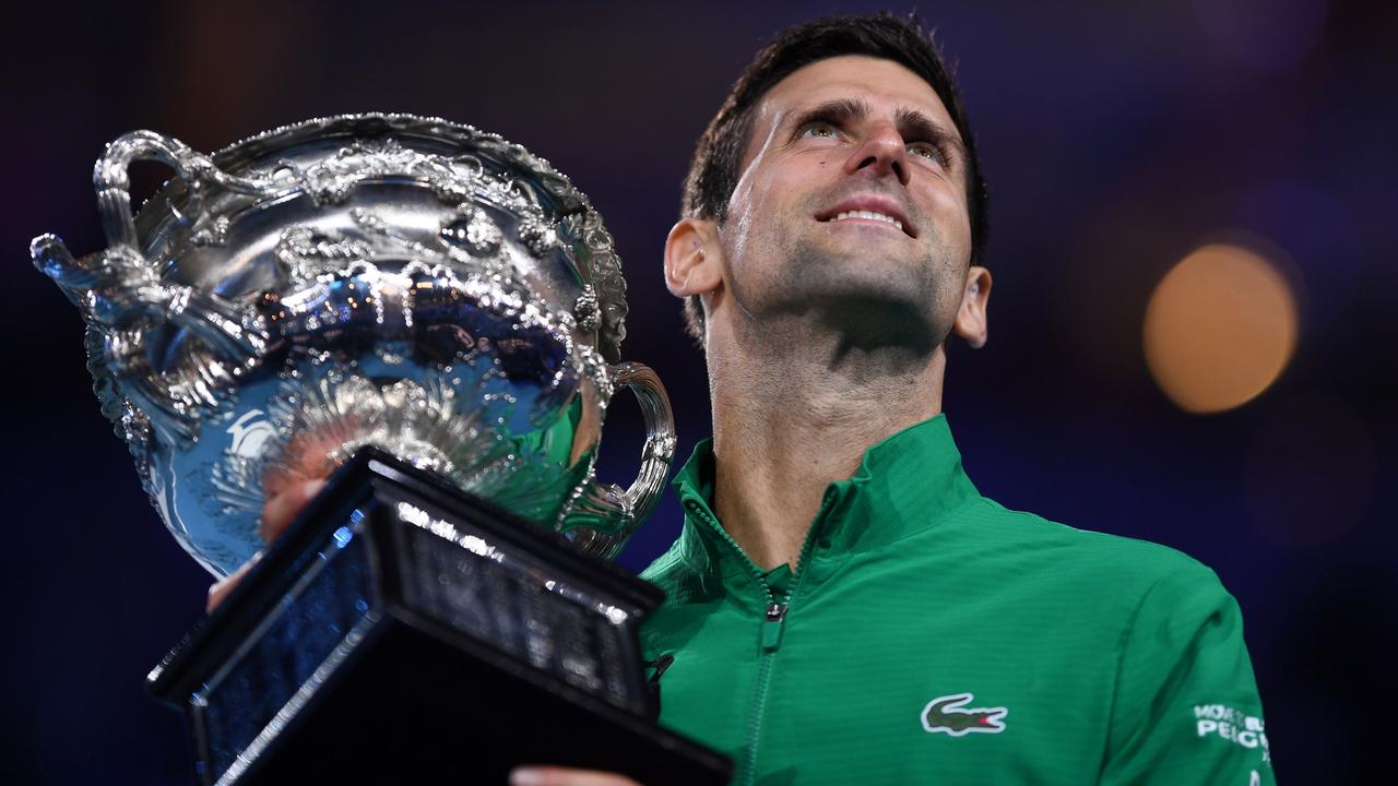 If Novak Djokovic wins the Australian Open again, he could be holding up the Norman Brookes Challenge Cup on Valentine’s Day. (Photo by Saeed KHAN / AFP)