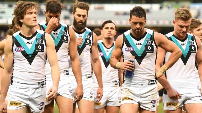 Port Adelaide players leave the ground on Saturday. Picture: AAP Images