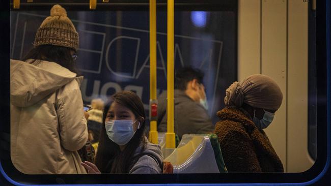 Some would argue masks are even more essential on a tram. Picture: Daniel Pockett