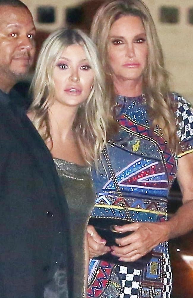 Caitlyn Jenner and girlfriend Sophia Hutchins look very concerned after a party-goer at Kylie's 21st birthday party is taken away face down on a stretcher. Picture: BACKGRID.