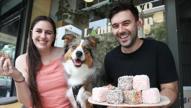 Tokyo Lamington’s happy customers include Kat Ryan, 32, Nick Krajewski, 31 and their dog Mina. Picture: David Swift