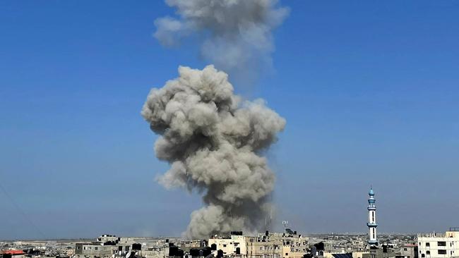 Smoke and dust rise following an Israeli strike on Rafah on Thursday. Picture: AFP