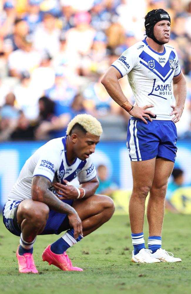 Viliame Kikau and Matt Burton of the Bulldogs look on after a tough round one clash with the Eels. Picture: Brendon Thorne/Getty Images