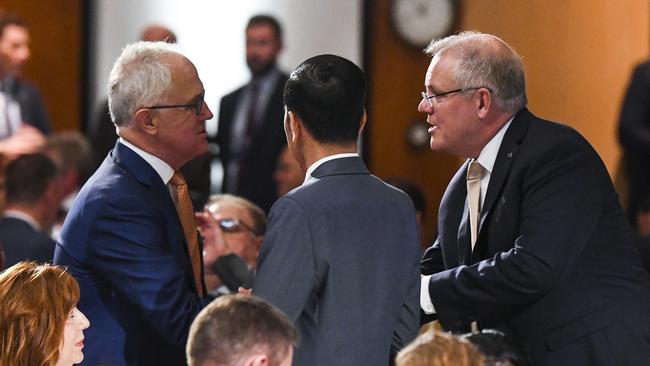 Former Australian Prime Minister Malcolm Turnbull, Indonesian President Joko Widodo and Australian Prime Minister Scott Morrison speak as they attend an official luncheon in the Great Hall at Parliament House in Canberra in Ferbuaru, 202. Picture: Lukas Coch