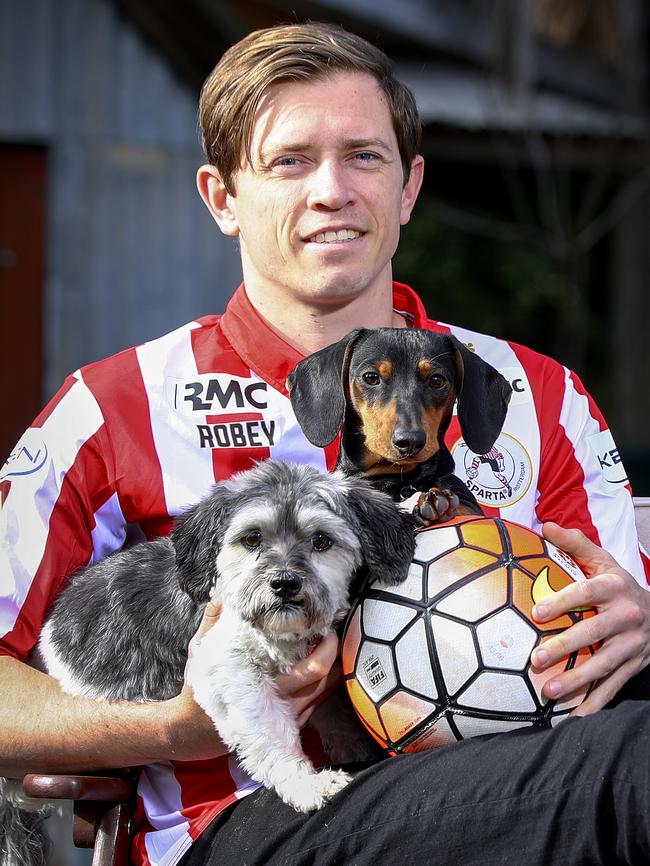 Craig Goodwin back in Adelaide in May with dogs Hamish and Chorizo. Picture: Sarah Reed