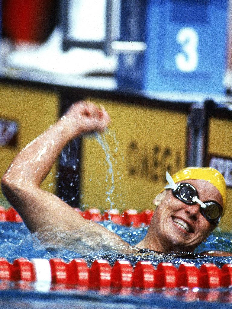 Lisa Curry celebrates after winning gold in the Womens 100m Breaststroke during the 1982 Commonwealth Games in Brisbane, Australia. Picture: Getty Images