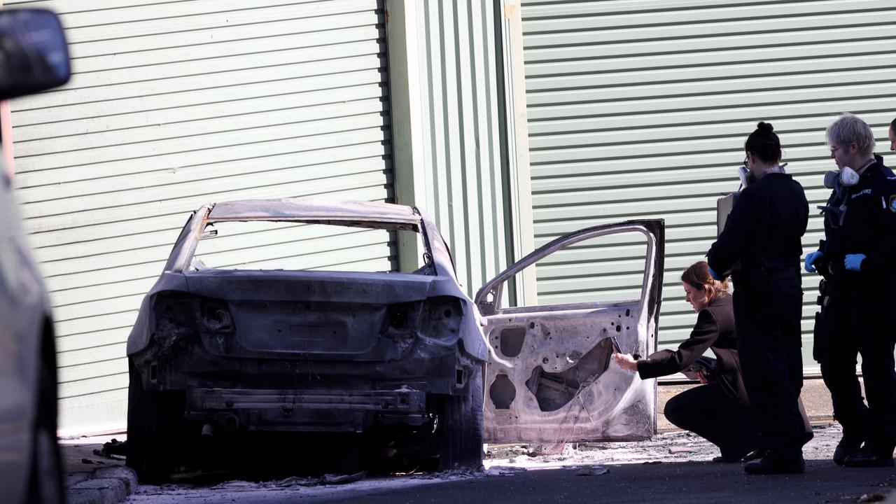 Police found a burnt out-car in Zetland. Another car, a Porsche that was only partially torched and was closer to the scene, had a gun inside of it. Picture: NCA NewsWire / Damian Shaw