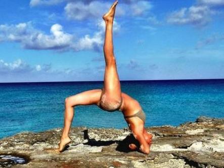 Meghan's Instagram was full of gems like this beach yoga snap.
