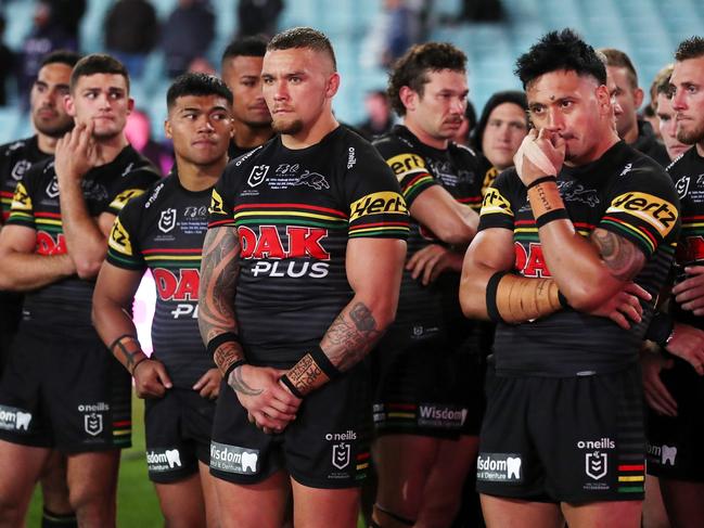 SYDNEY, AUSTRALIA - OCTOBER 25: James Fisher-Harris of the Panthers and team mates look dejected after losing the 2020 NRL Grand Final match between the Penrith Panthers and the Melbourne Storm at ANZ Stadium on October 25, 2020 in Sydney, Australia. (Photo by Cameron Spencer/Getty Images)