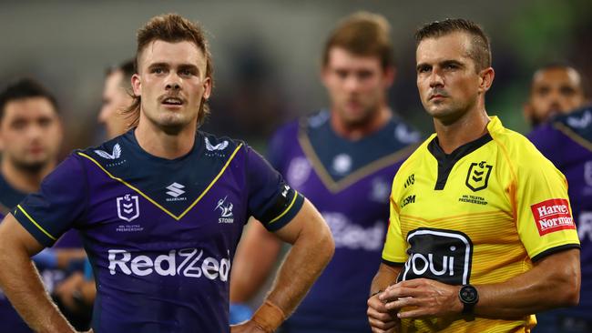 Melbourne star Ryan Papenhuyzen and referee Grant Atkins during the 2021 season opener. Picture: Robert Cianflone/Getty Images