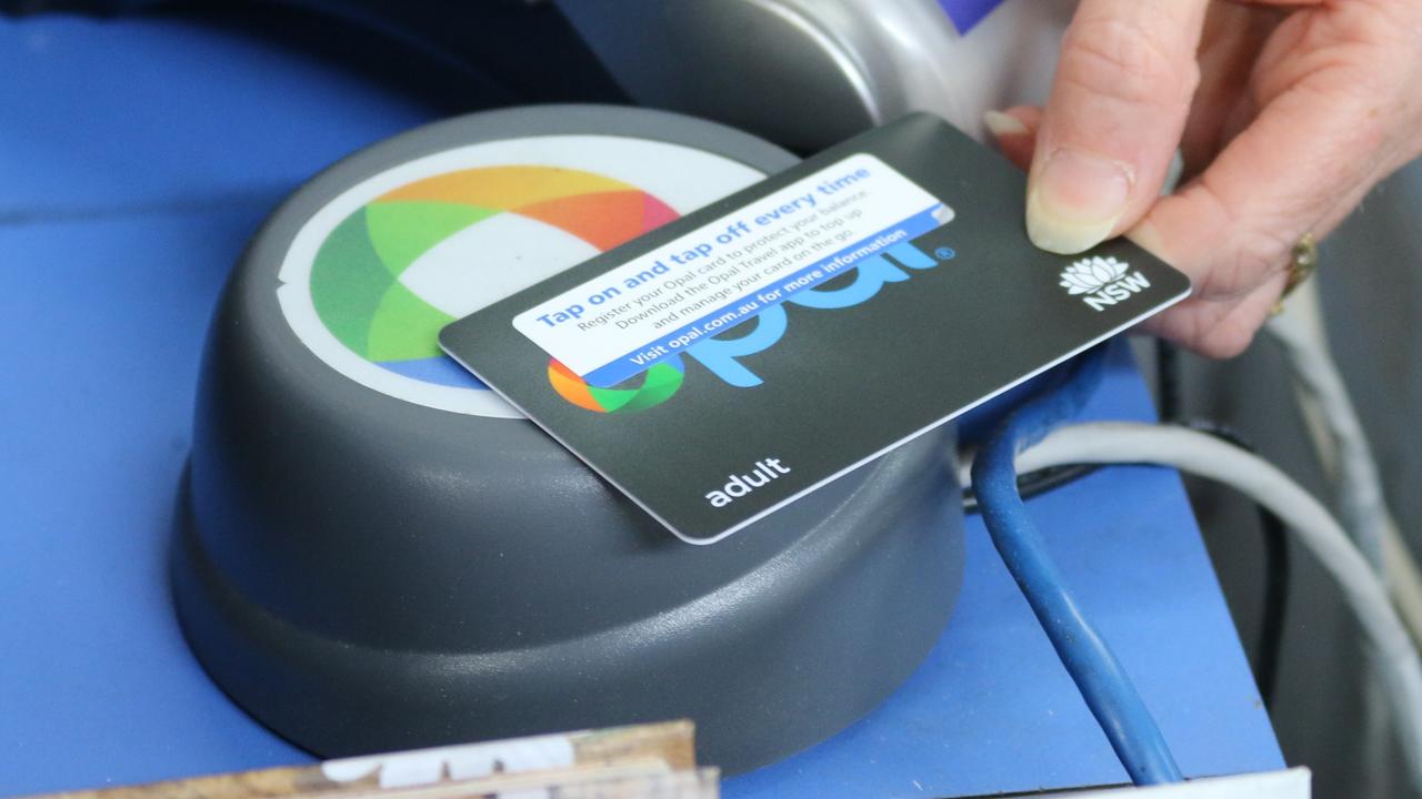 A newsagent in The Hills tops up a new opal card. Picture: Jake McCallum