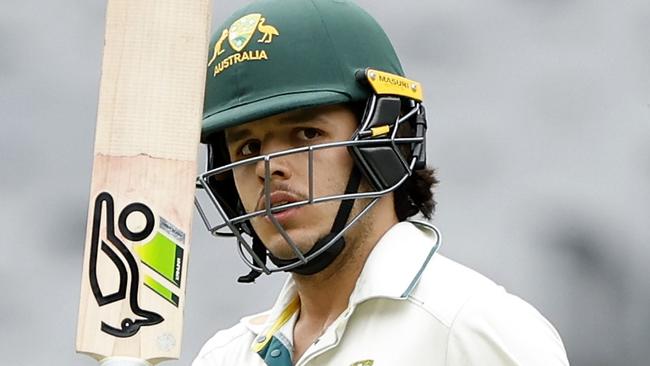 MELBOURNE, AUSTRALIA - NOVEMBER 09: Sam Konstas of Australia A raises his bat after scoring 50 runs during the game between Australia A and India A at Melbourne Cricket Ground on November 09, 2024 in Melbourne, Australia. (Photo by Darrian Traynor/Getty Images)