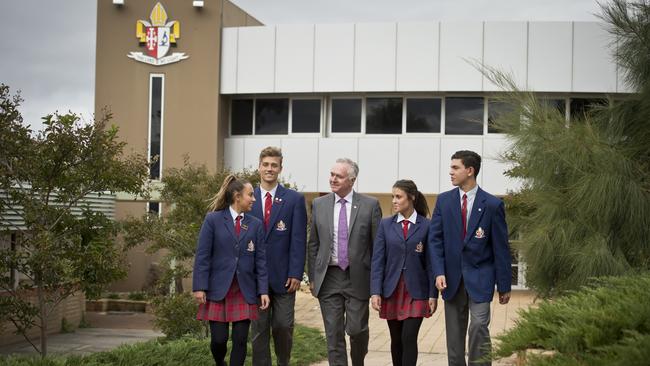 Principal Jim Laussen with students at Overnewton Anglican Community College.